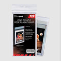 Ultra PRO One-Touch Resealable Bags pack of 100 clear plastic card sleeves, shown in its retail packaging with one sample bag visible outside the package.
